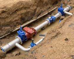 image of new water pipe in the ground